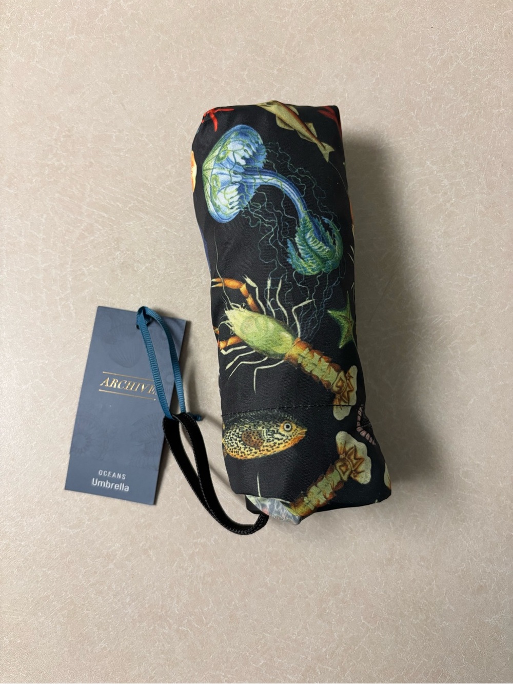 Compact Black Umbrella with Colorful Sea Creature Print. - Picture 7 of 9